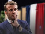 Џон Кајгер: Макрон покушава да заплаши француске гласаче
